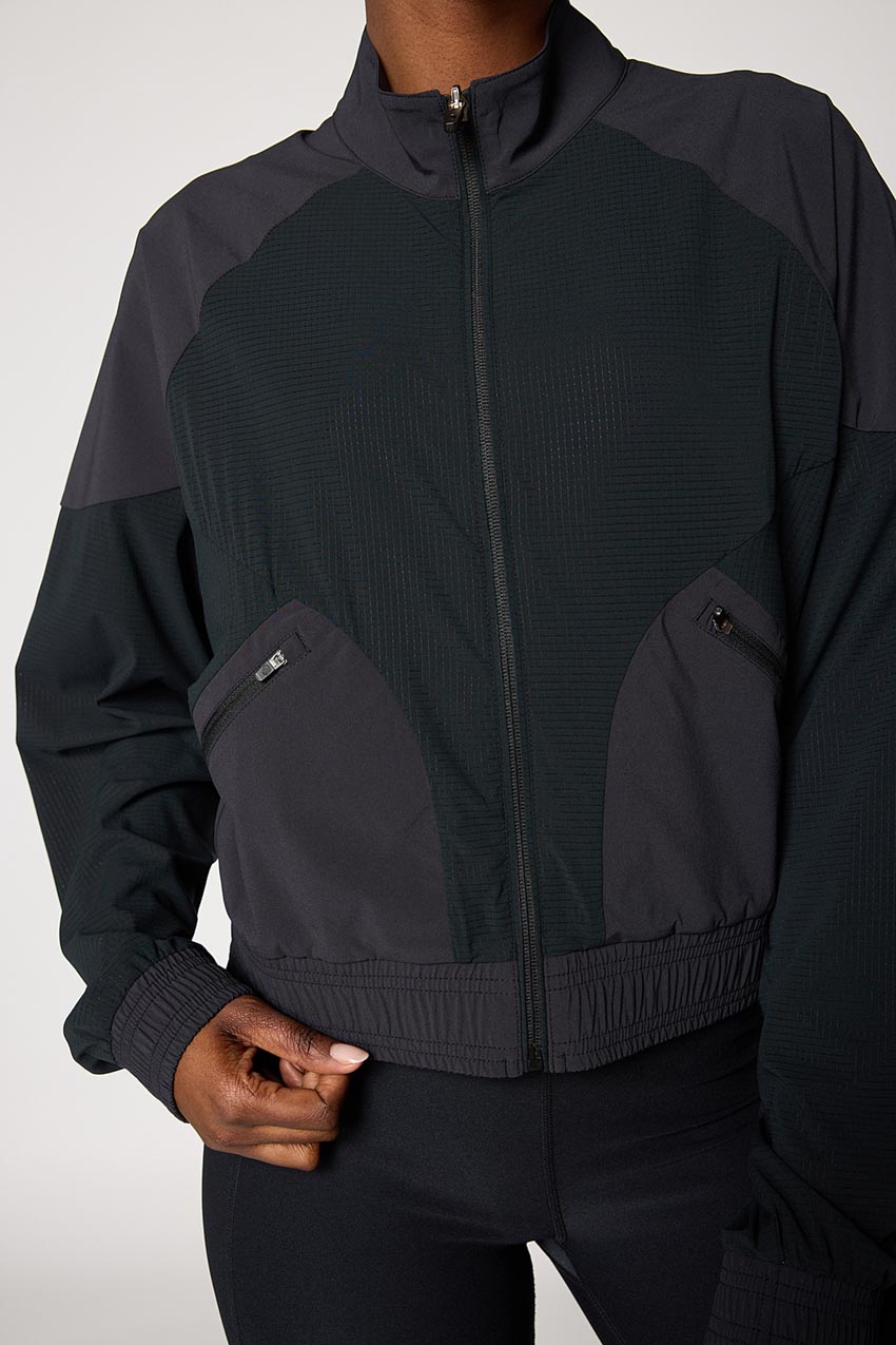 Chaqueta ligera con paneles de trek - negro